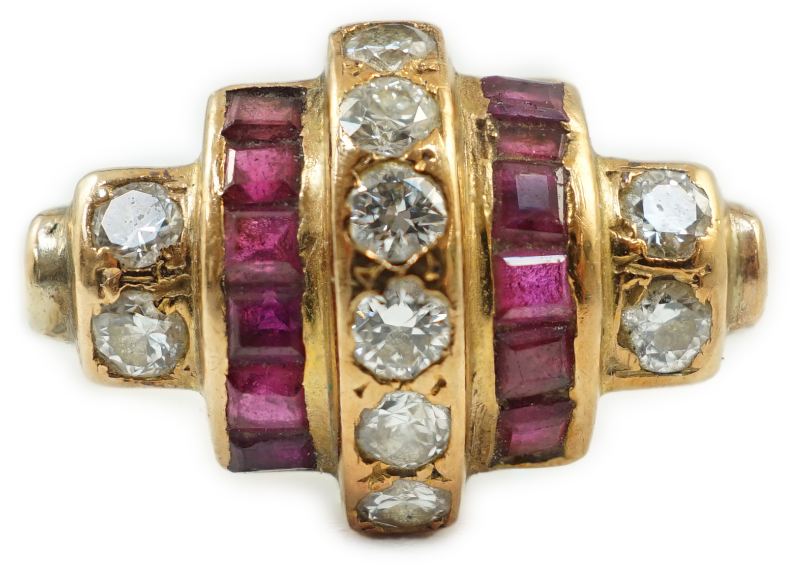 A 1950's gold and graduated five row ruby and diamond set demi lune dress ring